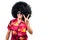 Cheerful male in Afro wig gesturing V sign