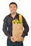 Cheerful man carrying shopping bag with food