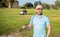 cheerful man portrait playing golf game on green grass, golfing