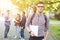 Cheerful man is studying at university