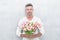 cheerful man with valentines tulips. man with valentines tulips in studio.