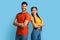 Cheerful Millennial Middle Eastern Couple Standing With Folded Arms Over Blue Background