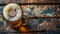 A cheerful mug of beer with smiley face on the foam, on a rustic wooden table background with space for text, perfect