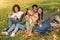 Cheerful Multiethnic Group of Teen Friends Having Fun Outdoor