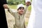 Cheerful Muslim boy in the park