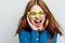 cheerful national woman wearing yellow glasses blue shirt close-up