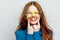 cheerful national woman wearing yellow glasses blue shirt close-up