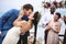 Cheerful newlyweds at beach wedding ceremony