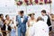 Cheerful newlyweds at beach wedding ceremony