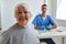 cheerful old woman at the hospital receiving a doctor communication consultation