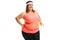 Cheerful overweight woman measuring her waist with a measuring t