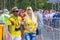 cheerful painted football fans from Colombia rejoice at the FIFA World Cup