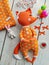 Cheerful red textile toy fox stuffed toy handmade, top view and sewing accessories