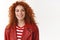 Cheerful redhead modern stylish woman heading work good mood getting hair done curls smiling delighted look aside dreamy