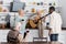 cheerful retired woman playing acoustic guitar