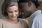 Cheerful romantic middle aged multiethnic couple casual close up