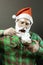 Cheerful Santa is eating ice cream from a bowl. Funny fake santa. Foam beard. Adjoining christmas poster