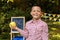 Cheerful schoolboy with an apple. Back to school. The concept of education, school, childhood