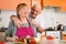 Cheerful senior couple cooking