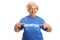 Cheerful senior volunteer woman pointing to the t-shirt