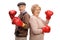 Cheerful seniors with boxing gloves