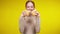 Cheerful slim smiling woman tearing ciabatta and looking at camera. Happy young Caucasian lady posing with tasty crusty