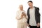 Cheerful smiling elderly couple in casual clothes having fun with technology, old man and woman in hoodies looking at