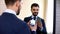 Cheerful smiling male in formalwear taking selfie in mirror reflection at home