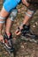 Cheerful sporty man 50-55 years old riding the roller skating in park in autumn season, rollerblading as healthy exercise for all