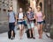 Cheerful tourists walking the street