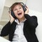 Cheerful woman with a big stereo headphones