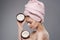 Cheerful woman with coconuts in her hands naked shoulders natural cosmetics therapy skin care