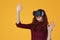 Cheerful woman exploring virtual reality