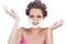 Cheerful woman with hands up and shaving foam on face