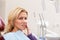 Cheerful woman having dental checkup