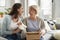 Cheerful woman informs mom that she will become a grandmother