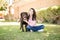 Cheerful woman with pet dog