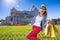 Cheerful woman in Rome, Italy with shopping bags rejoicing