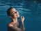 cheerful woman Swimming in the pool relaxation enjoyment nature