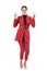 Cheerful young business woman in red suit celebrating victory with two finger hand peace sign.