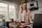 Cheerful young female blogger browsing for online recipe to prepare salad of fresh vegetables and post on social media