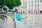 Cheerful young French woman having fun on Saint-Martin canal