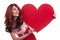 Cheerful young girl holding big red heart in her hands. Valentine`s Day