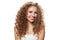 Cheerful young healthy lady portrait. Perfect woman with long frizzy hairstyle, natural makeup and fresh skin isolated