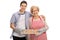Cheerful young man and elderly lady holding tray of cookies