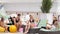 Cheerful young people in bathing suits enjoy colored drinks and sitting on sun lounger