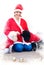 Cheerful young woman in christmas outfit accompanied by two sweet poodles.