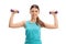 Cheerful young woman exercising with dumbbells