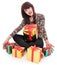 Cheerful young woman with lots of gifts