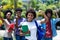 Cheering african amerlcan female university student with group of african american students